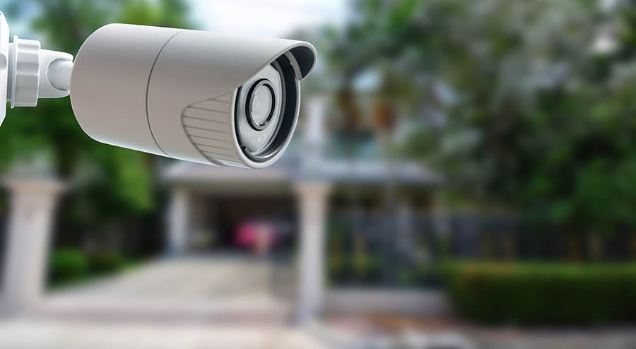 Security Camera with Residential Home in the Background