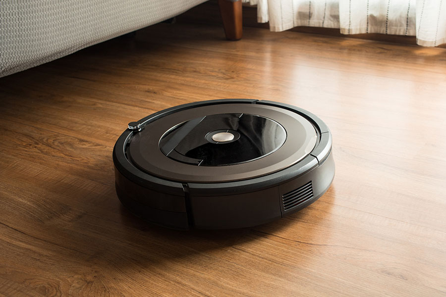 Robot vacuum cleaner on wood, laminate floor