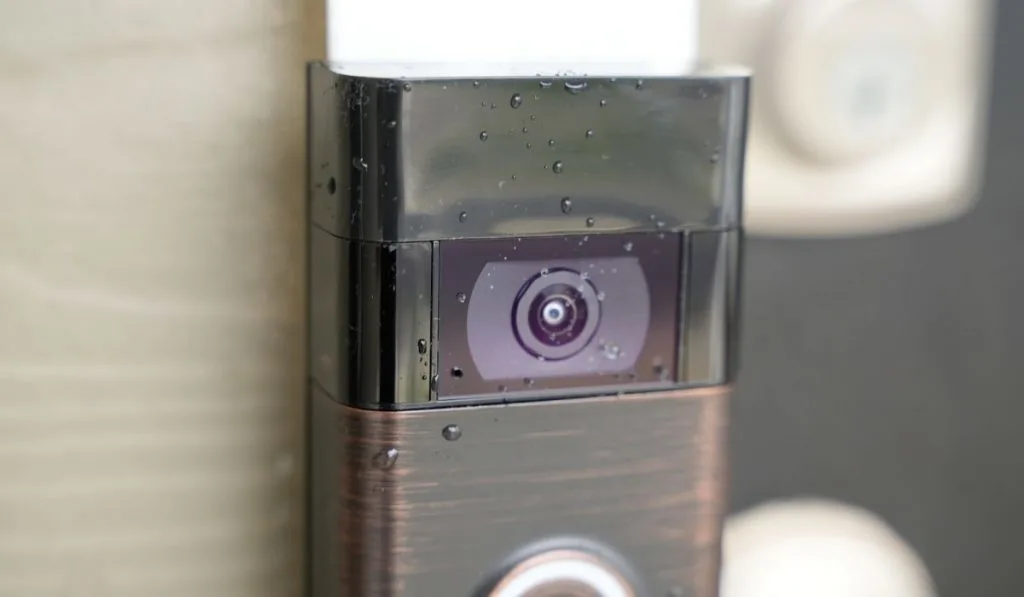 Close up of Ring Doorbell with water on it