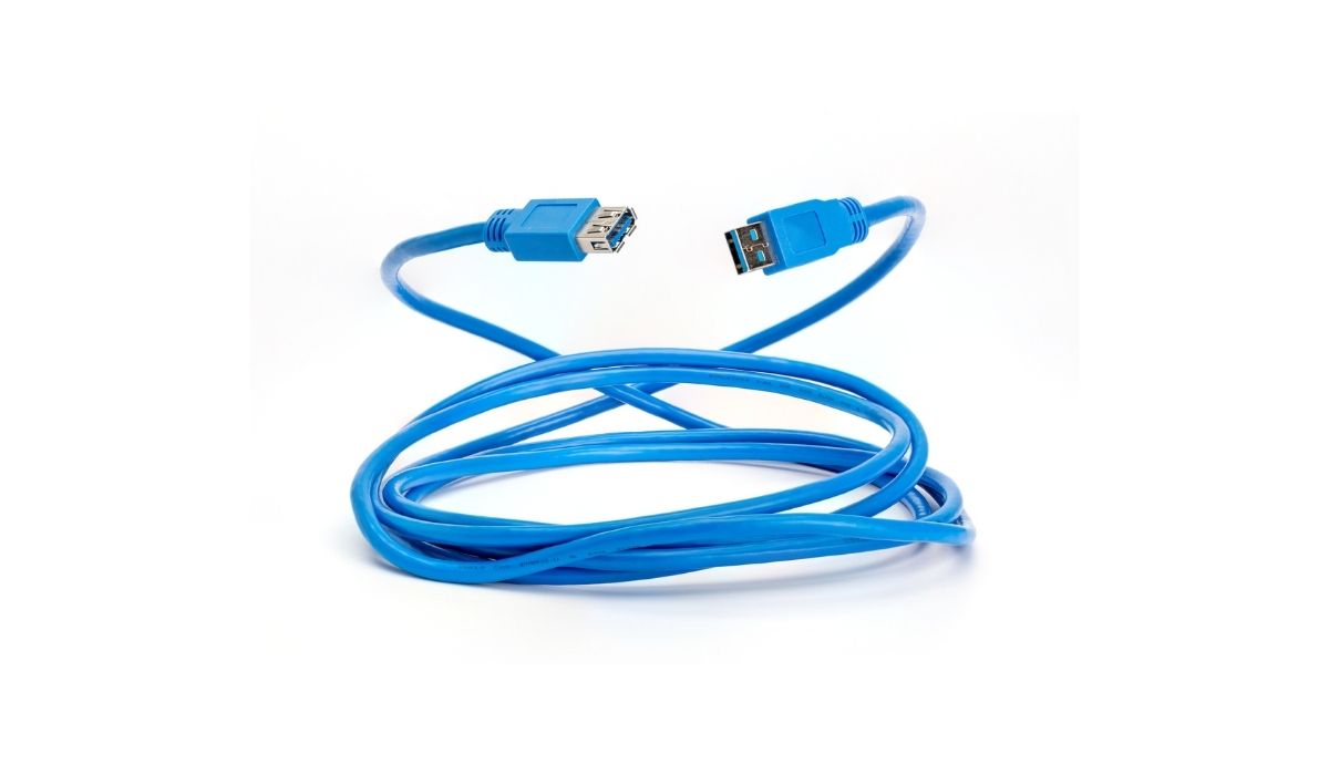 Rolled up blue USB 3 extension cable