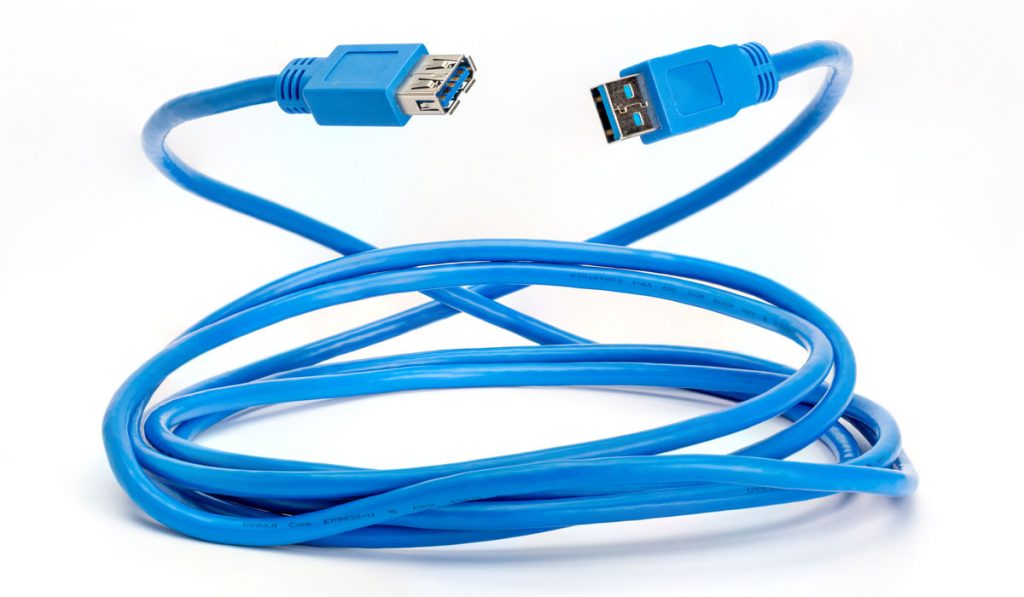 Rolled up blue USB 3.0 extension cable