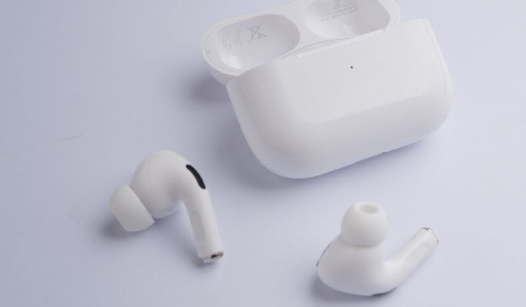 Airpods pro with case on a white background