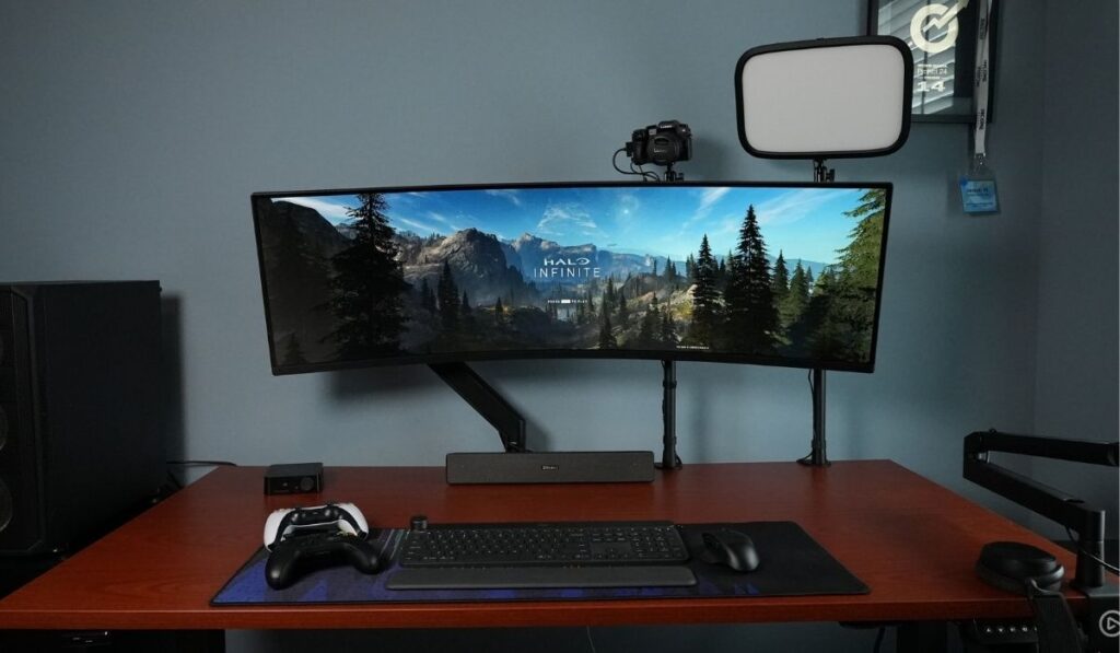 Super Ultra Wide Samsung Monitor Playing Halo Infinite with Controllers Centered Wide - 1