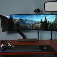 Super Ultra Wide Samsung Monitor Playing Halo Infinite with Controllers Centered Wide