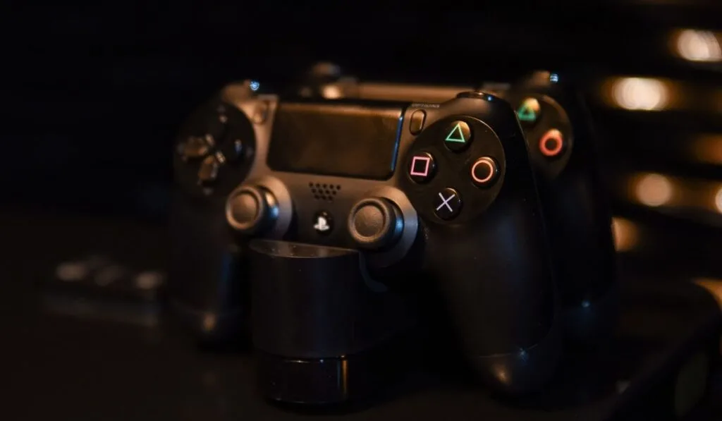 Black gamepad on a dark background