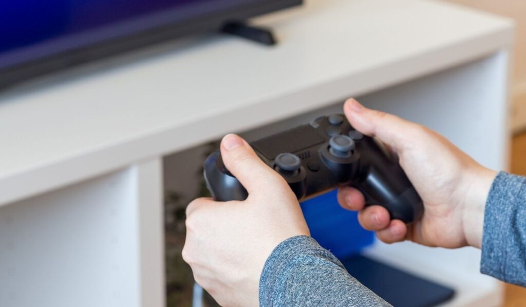 Woman hands with a game controller 