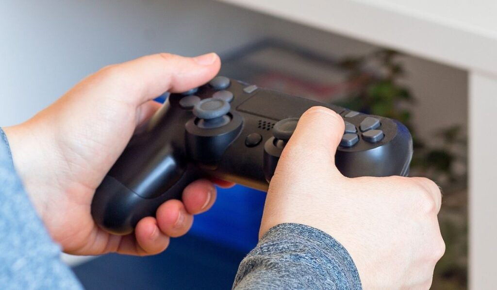 Woman hands with a game controller 
