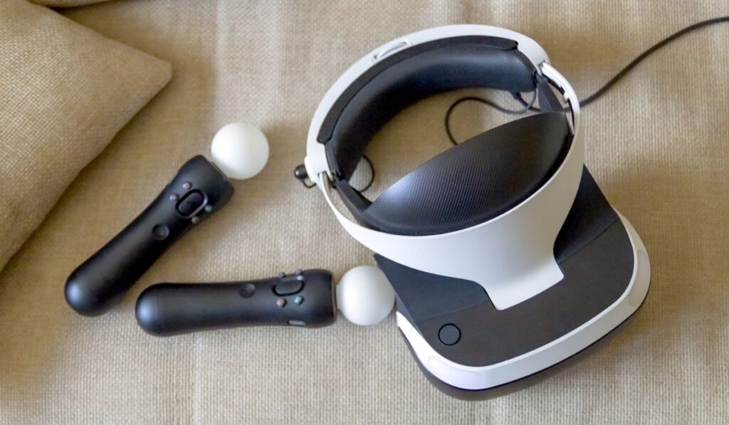 A playstation 4 VR headset together with a playstation 4 controller