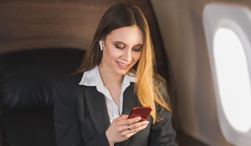 Attractive woman in private jet 