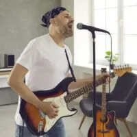 Musician standing in rehearsal room