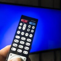 TV remote and blue screen