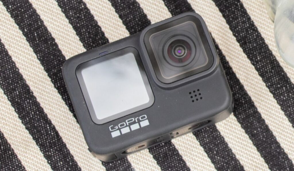 GoPro HERO 9 camera and mask for diving on the beach 