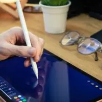 Man using digital tablet for drawing