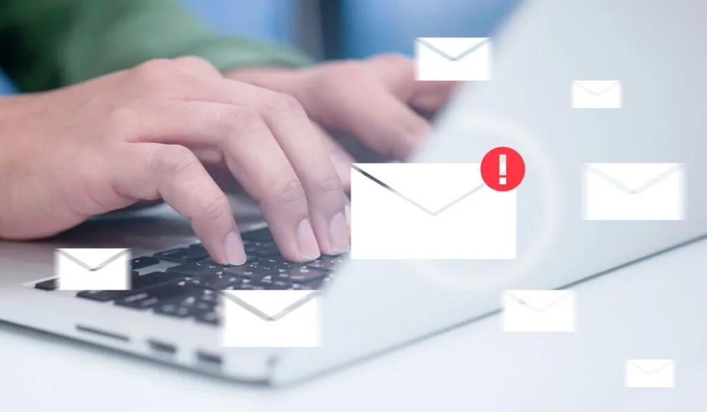 close up of computer and email icon with error message - Smaller