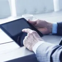 Man using tablet pc on the office