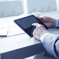 Man using tablet pc on the office