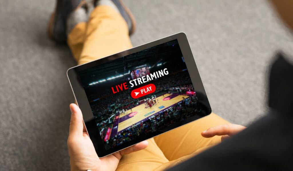 Man watching sports on live streaming online service 