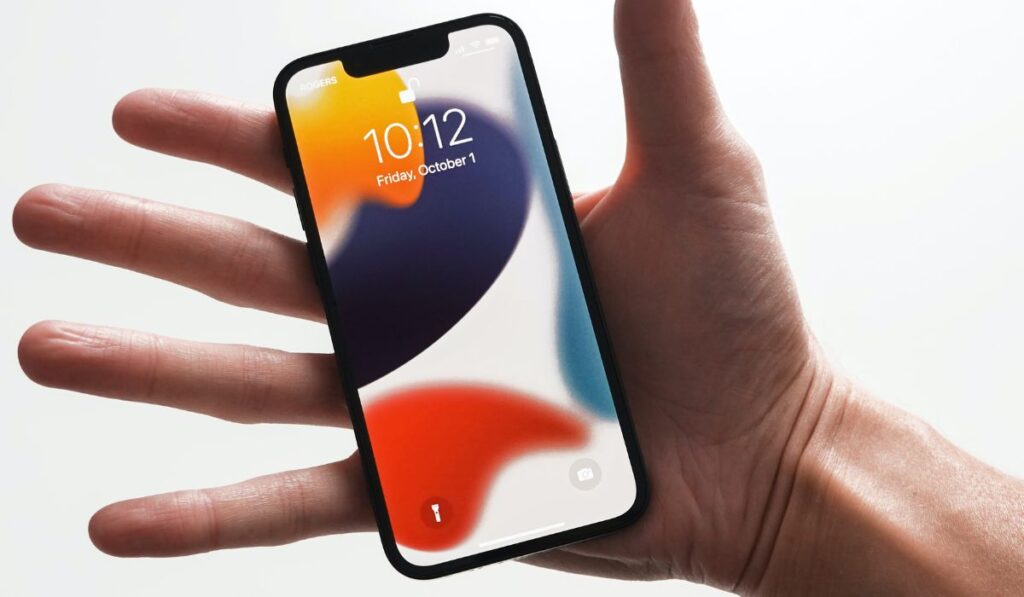 Iphone 13 in man's hand