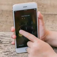 Phone is in the child`s hand