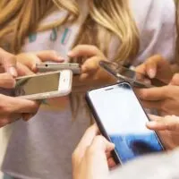 Group of young people with mobile phones