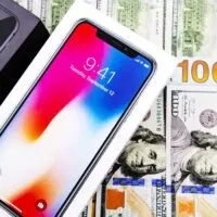 IPhone on a background of money