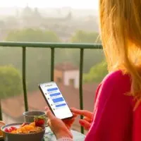 Woman using instant messaging app on phone