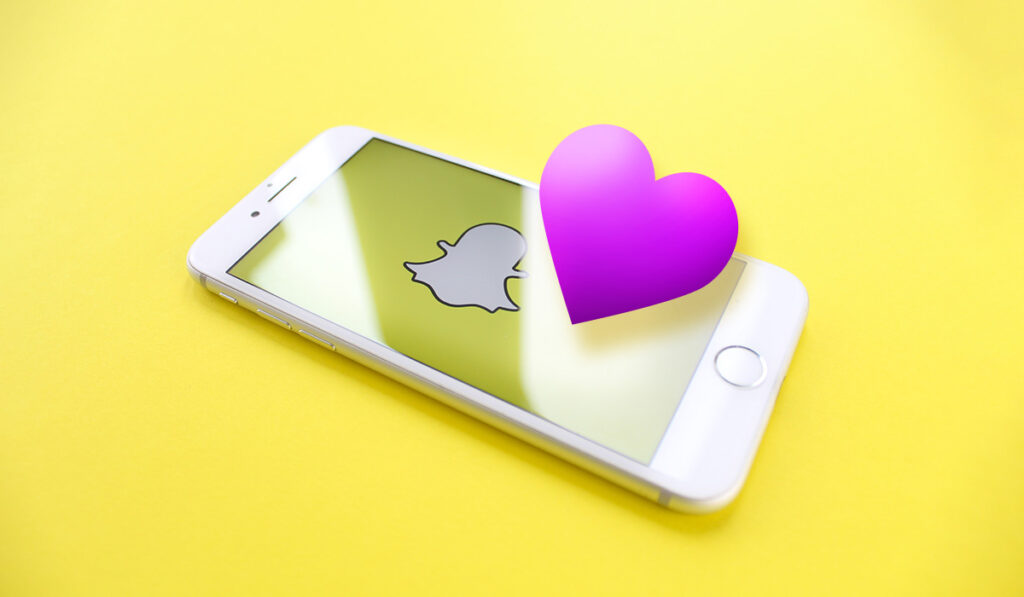 CGI rendering phone with the Snapchat logo with a purple heart